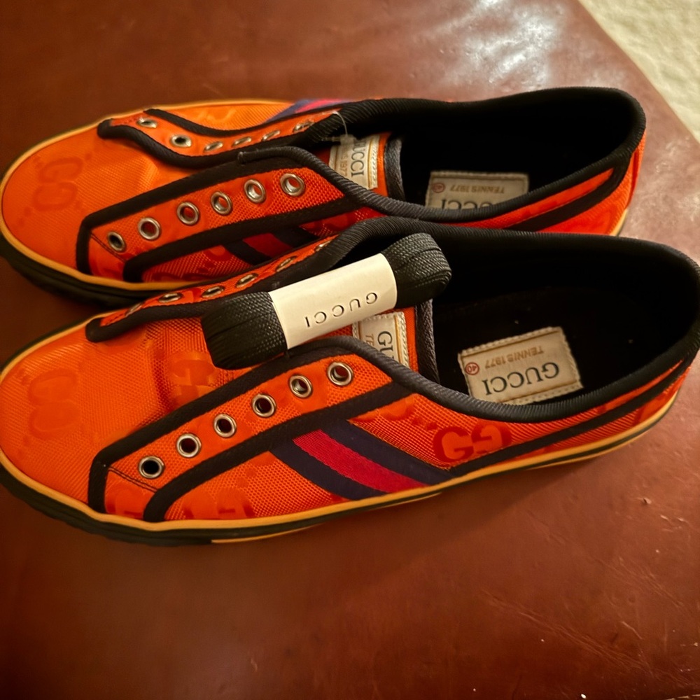 Gucci Men's Orange and Black Sneakers
Very good condition